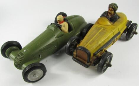 Two plaster models of vintage racing cars