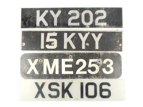 Four number plates