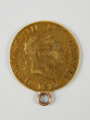 A George III gold half sovereign 1817