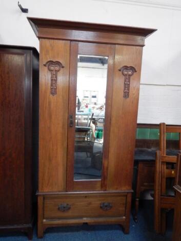 An Art Nouveau oak wardrobe