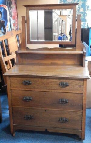 An Art Nouveau oak dressing chest