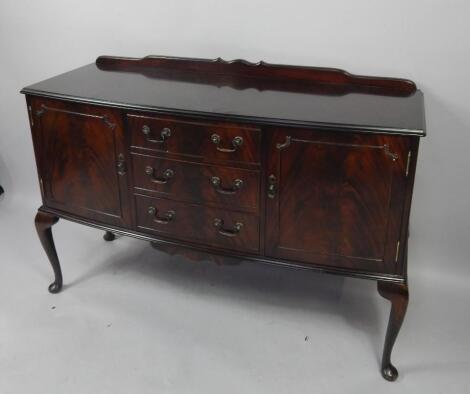 A Georgian style mahogany bow front sideboard