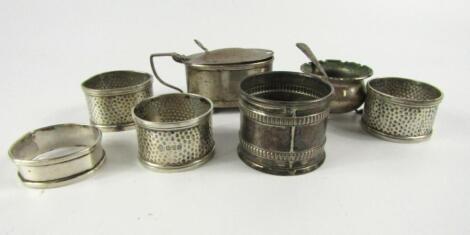 Three George V silver circular napkin rings