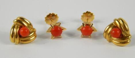 A pair of 18ct gold and coral ear studs of knot form