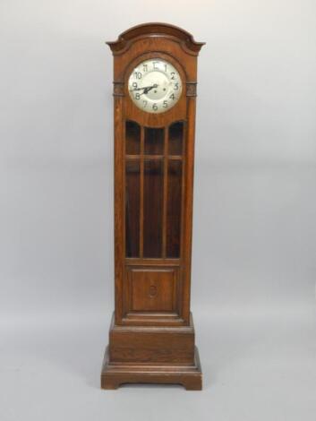 An early 20thC oak cased grandmother clock