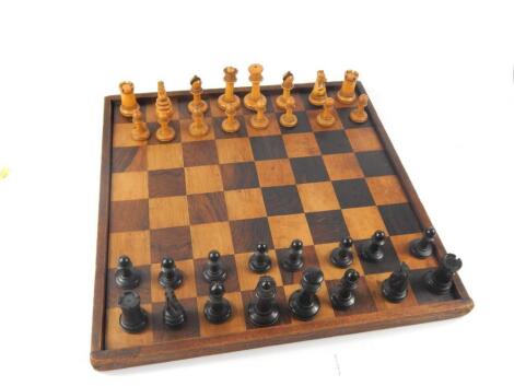 A Victorian turned boxwood and ebony chess set