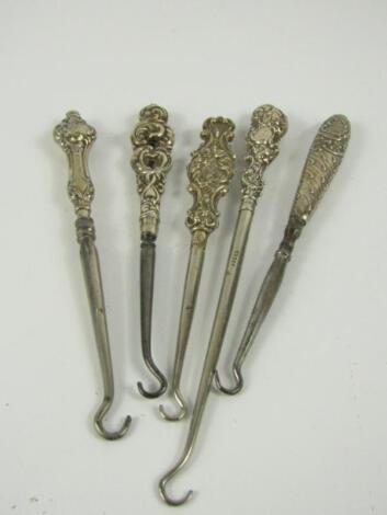 Five late Victorian/Edwardian steel button hooks