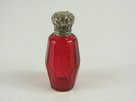 A Victorian slice cut cranberry glass scent bottle