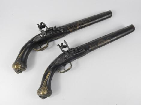 A pair of replica flintlock pistols