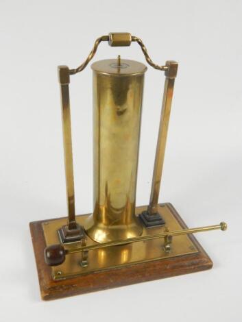 A brass shell case table gong