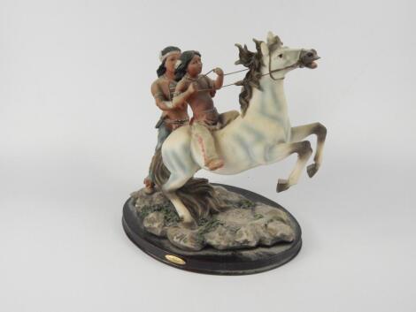 A Juliana Collection figure group of two native American Indians and a horse