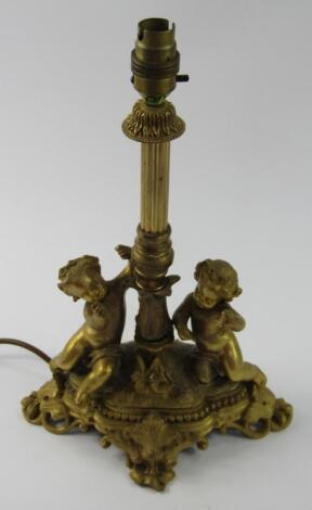 A gilt metal table lamp