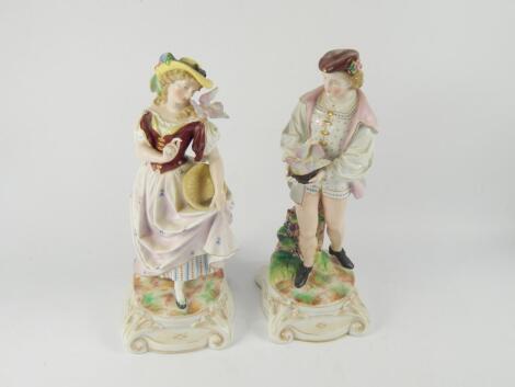 A pair of German late 19thC porcelain figures