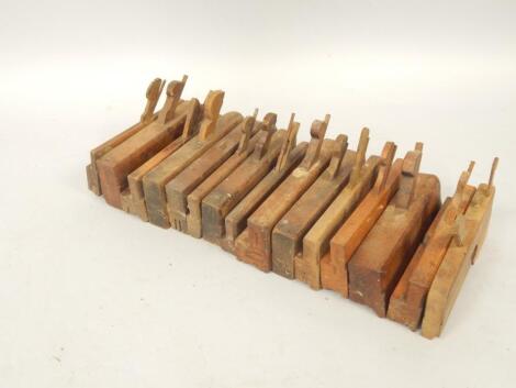 Fifteen woodworkers moulding planes.