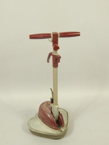 An Electrolux early 20thC metal and red plastic floor cleaner