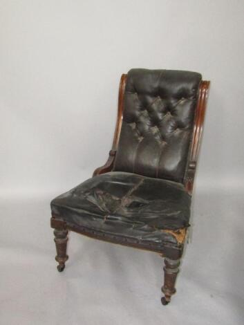 A Victorian mahogany lady's armchair