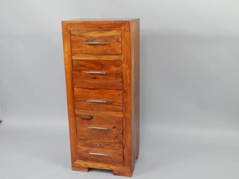 An Eastern hardwood chest of drawers