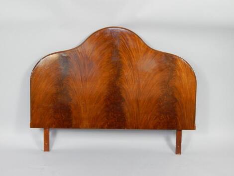 A 1920's flame mahogany double head board.