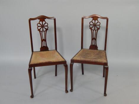 A pair of Edwardian mahogany bedroom chairs