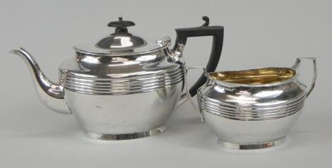 A George V oval silver teapot