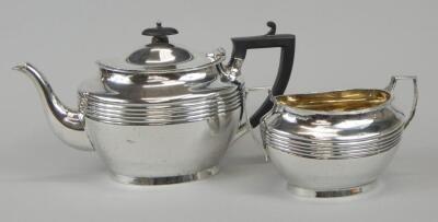 A George V oval silver teapot