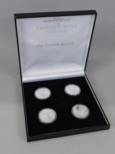 Four commemorative coins from the Crown Jewels Silver Proof coin set series