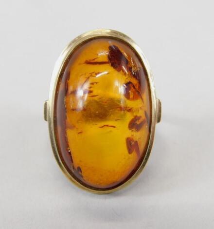 A 9ct gold amber style dress ring