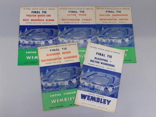 A collection of FA Cup final programmes