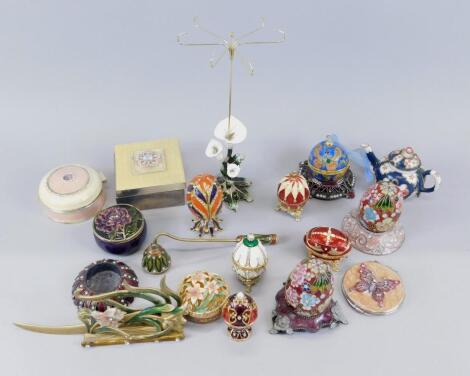 A large quantity of modern enamel style metal trinket boxes