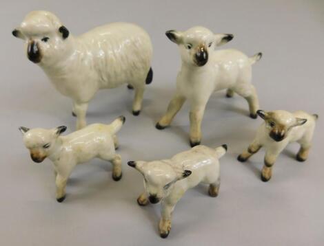 Five Beswick sheep