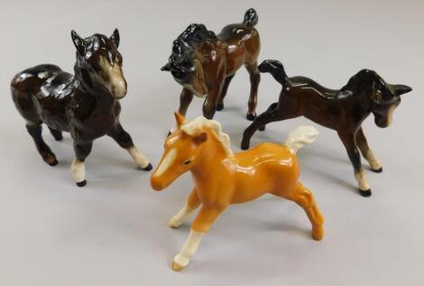 Four Beswick foals