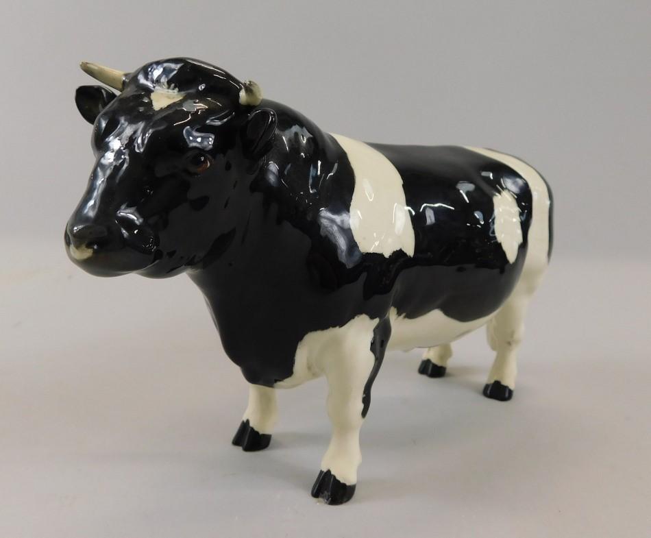 A Beswick model of a Fresian Bull Champion Coddington Hilt Bar