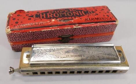 A Hohner Super Chromonica harmonica