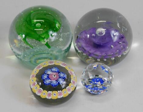 Four paperweights