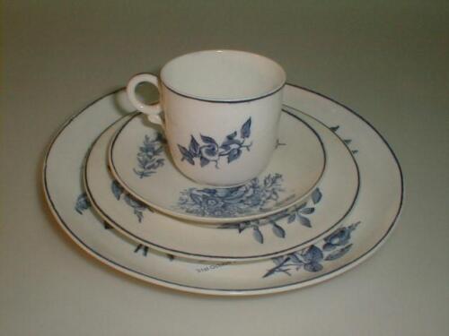 A Royal Worcester porcelain trio comprising coffee cup