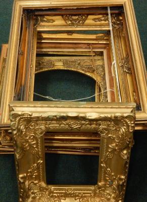 Eleven gilt picture frames