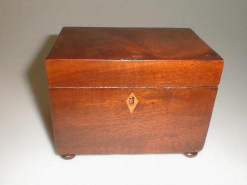 A 19thC figured mahogany tea caddy of oblong form