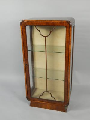 An Art Deco walnut display cabinet