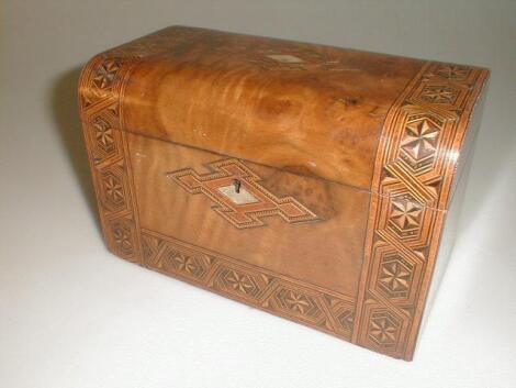 A 19thC walnut tea caddy of oblong form with Tonbridge ware type marquetry banding