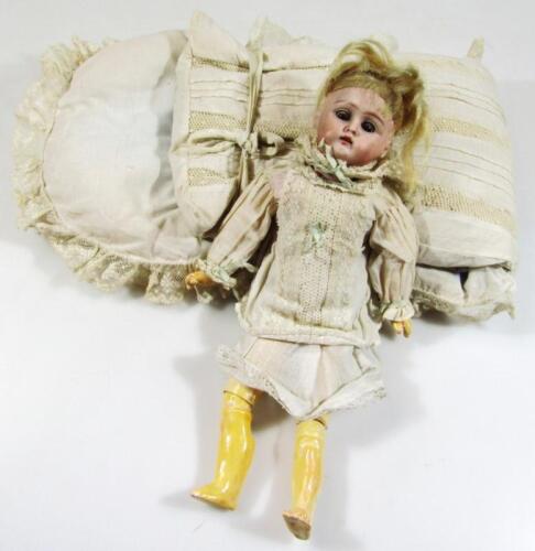 A 19thC German Diponirt bisque headed doll