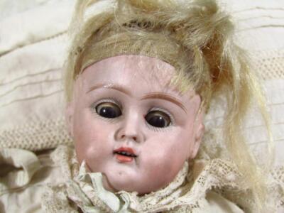 A 19thC German Diponirt bisque headed doll - 2