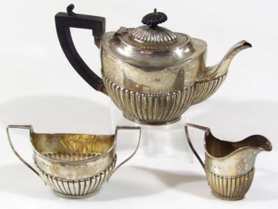 A matched late Victorian and Edwardian three piece bachelor's tea service