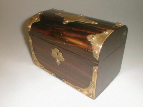 A 19thC coromandel tea caddy decorated with applied brass strapwork