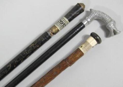 Three antique sword sticks. (AF)