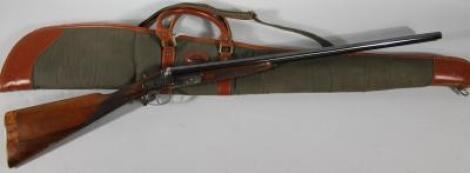 A Cogswell & Harrison 12 bore side by side shotgun