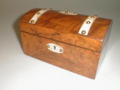 A 19thC walnut tea caddy of oblong form