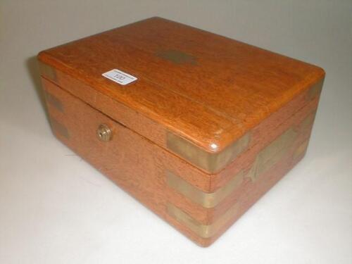 An Edwardian brassbound oak two section box £40-60