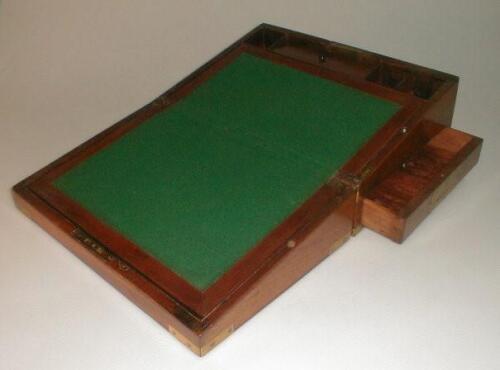 A 19thC writing slope having brass bound corners and centre escutcheon 13£" wide