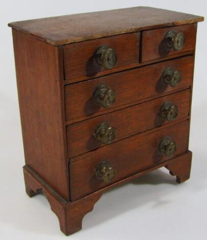 An early 20thC oak miniature chest