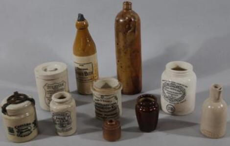 Various stoneware advertising pieces etc.